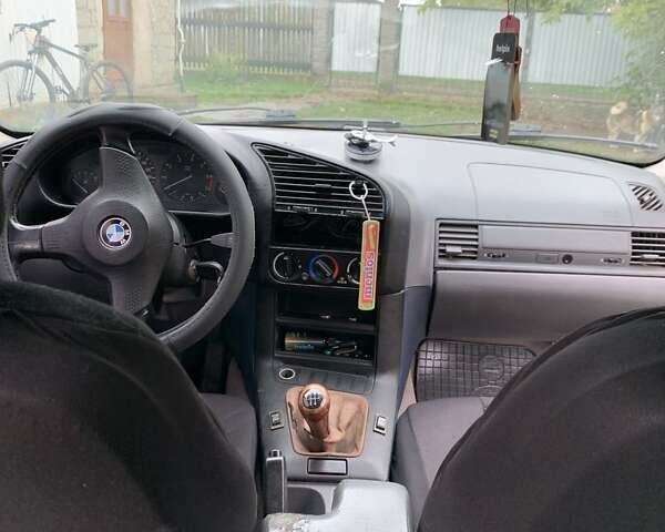 Синій БМВ 3 Серія, об'ємом двигуна 1.8 л та пробігом 222 тис. км за 2500 $, фото 2 на Automoto.ua