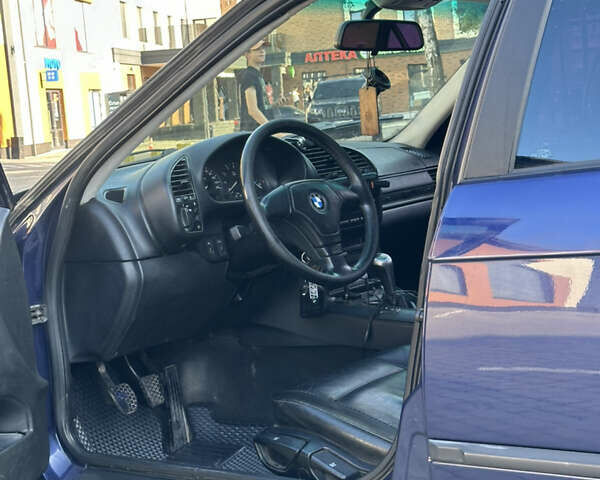 Синий БМВ 3 Серия, объемом двигателя 1.8 л и пробегом 375 тыс. км за 2650 $, фото 9 на Automoto.ua