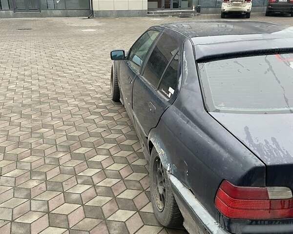 Синий БМВ 3 Серия, объемом двигателя 2.5 л и пробегом 250 тыс. км за 3200 $, фото 1 на Automoto.ua