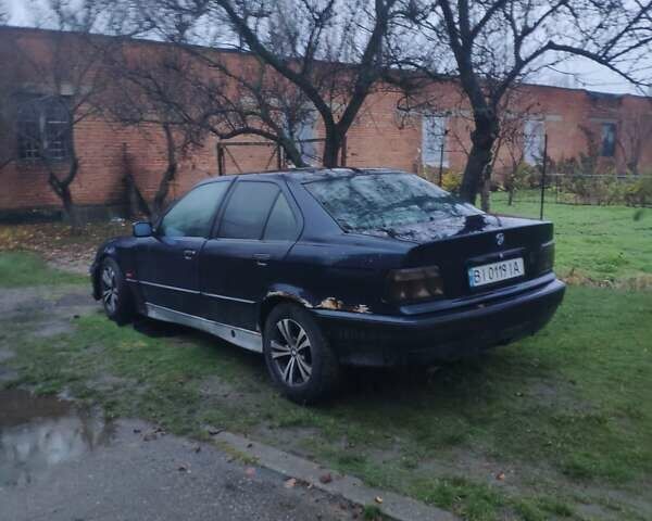 Синій БМВ 3 Серія, об'ємом двигуна 2 л та пробігом 380 тис. км за 2100 $, фото 3 на Automoto.ua