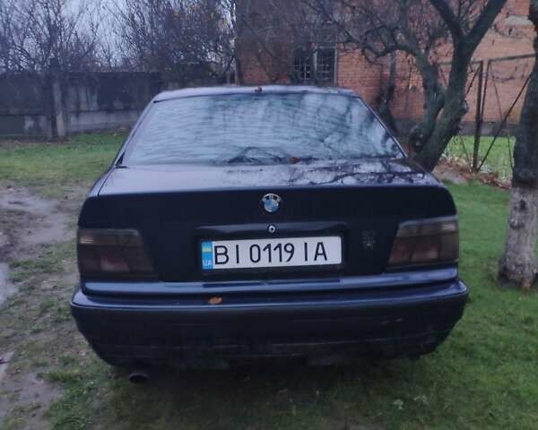 Синій БМВ 3 Серія, об'ємом двигуна 2 л та пробігом 380 тис. км за 2100 $, фото 1 на Automoto.ua