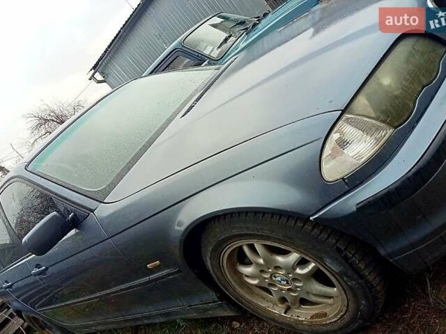 Синий БМВ 3 Серия, объемом двигателя 2 л и пробегом 325 тыс. км за 3700 $, фото 6 на Automoto.ua