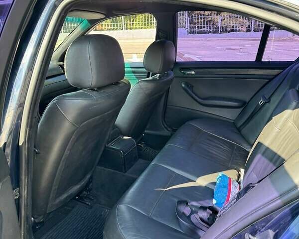 Синий БМВ 3 Серия, объемом двигателя 2 л и пробегом 285 тыс. км за 5200 $, фото 4 на Automoto.ua