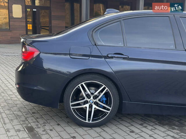 Синій БМВ 3 Серія, об'ємом двигуна 2 л та пробігом 245 тис. км за 12650 $, фото 6 на Automoto.ua