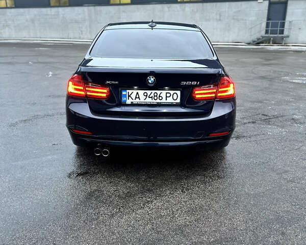 Синій БМВ 3 Серія, об'ємом двигуна 2 л та пробігом 206 тис. км за 12900 $, фото 4 на Automoto.ua