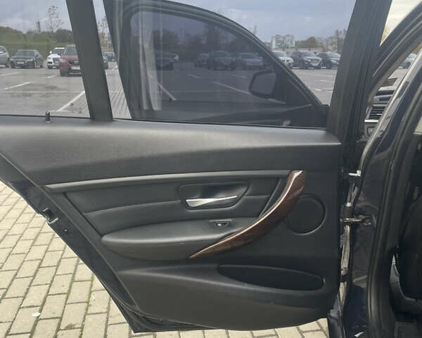Синий БМВ 3 Серия, объемом двигателя 2 л и пробегом 180 тыс. км за 13700 $, фото 18 на Automoto.ua