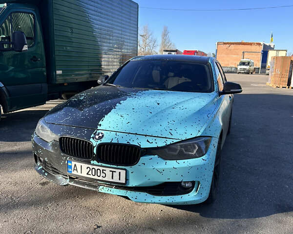 Синій БМВ 3 Серія, об'ємом двигуна 2 л та пробігом 180 тис. км за 13999 $, фото 4 на Automoto.ua