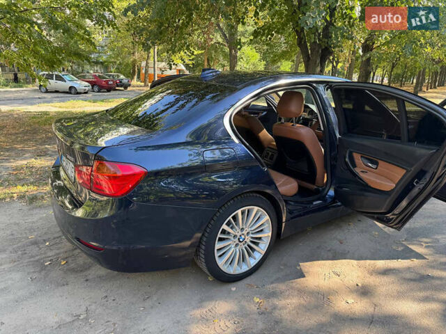 Синий БМВ 3 Серия, объемом двигателя 2 л и пробегом 125 тыс. км за 13300 $, фото 3 на Automoto.ua