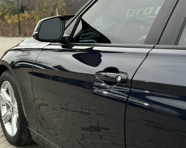 Синій БМВ 3 Серія, об'ємом двигуна 2 л та пробігом 65 тис. км за 15500 $, фото 24 на Automoto.ua