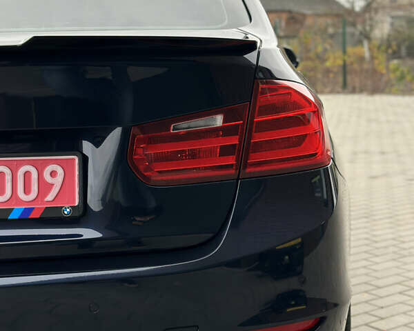 Синій БМВ 3 Серія, об'ємом двигуна 2 л та пробігом 65 тис. км за 15500 $, фото 19 на Automoto.ua