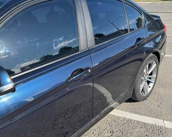 Синий БМВ 3 Серия, объемом двигателя 2 л и пробегом 129 тыс. км за 17999 $, фото 7 на Automoto.ua