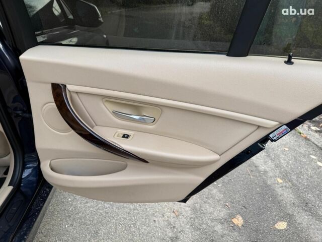 Синій БМВ 3 Серія, об'ємом двигуна 2 л та пробігом 105 тис. км за 15490 $, фото 15 на Automoto.ua