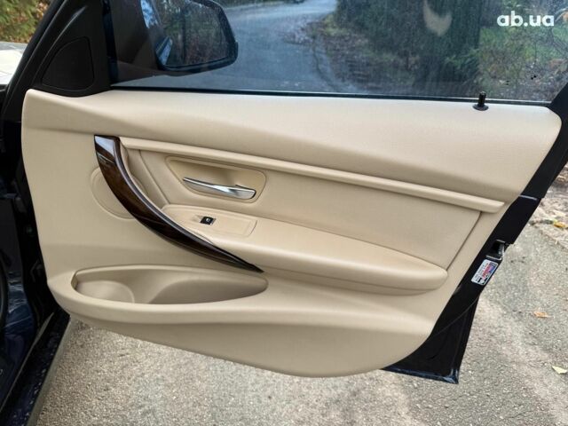 Синій БМВ 3 Серія, об'ємом двигуна 2 л та пробігом 105 тис. км за 15490 $, фото 18 на Automoto.ua