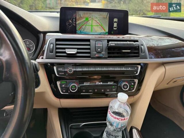 Синій БМВ 3 Серія, об'ємом двигуна 2 л та пробігом 105 тис. км за 15490 $, фото 11 на Automoto.ua