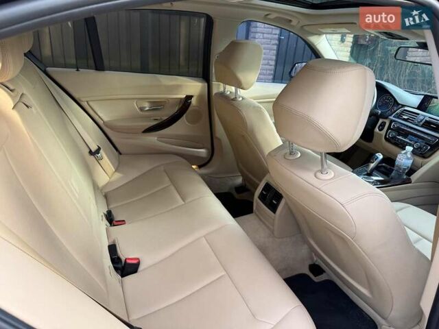 Синій БМВ 3 Серія, об'ємом двигуна 2 л та пробігом 105 тис. км за 15490 $, фото 16 на Automoto.ua