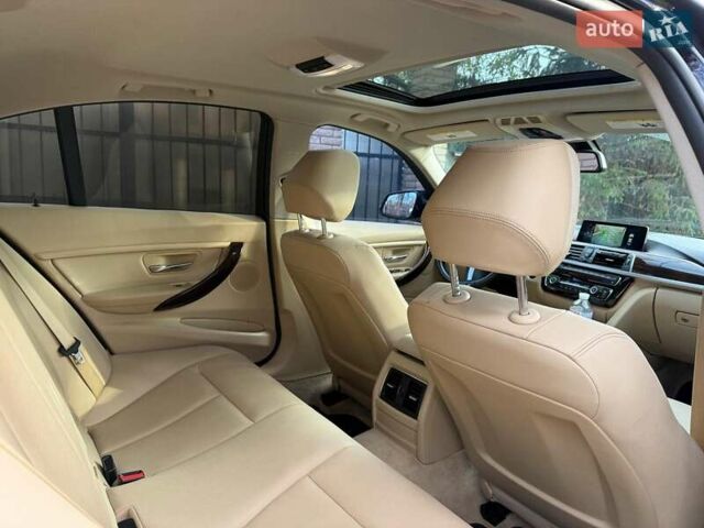 Синій БМВ 3 Серія, об'ємом двигуна 2 л та пробігом 105 тис. км за 15490 $, фото 17 на Automoto.ua