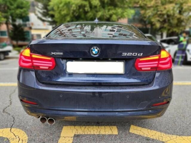 Синий БМВ 3 Серия, объемом двигателя 2 л и пробегом 122 тыс. км за 16000 $, фото 3 на Automoto.ua