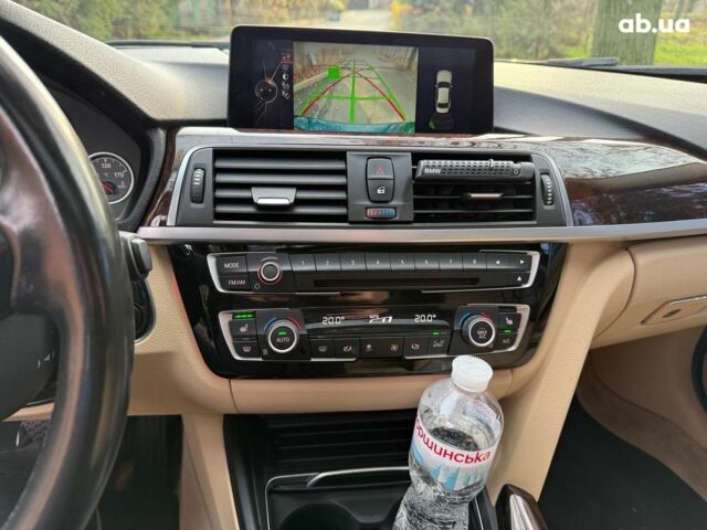 Синій БМВ 3 Серія, об'ємом двигуна 2 л та пробігом 105 тис. км за 15490 $, фото 11 на Automoto.ua