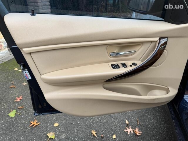 Синій БМВ 3 Серія, об'ємом двигуна 2 л та пробігом 105 тис. км за 15490 $, фото 8 на Automoto.ua