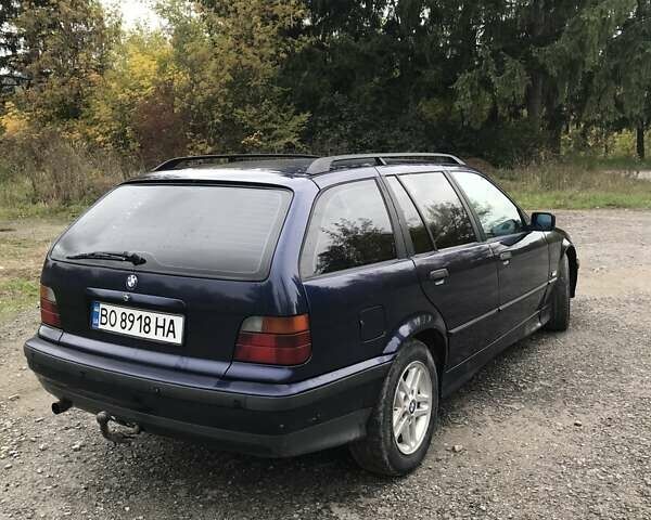 Синий БМВ 3 Серия, объемом двигателя 1.8 л и пробегом 380 тыс. км за 4000 $, фото 6 на Automoto.ua