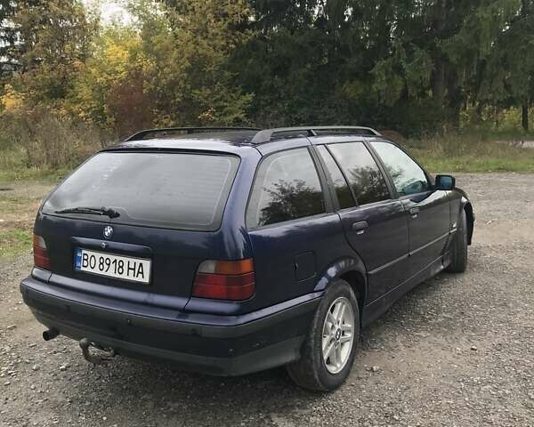 Синий БМВ 3 Серия, объемом двигателя 1.8 л и пробегом 380 тыс. км за 4000 $, фото 1 на Automoto.ua