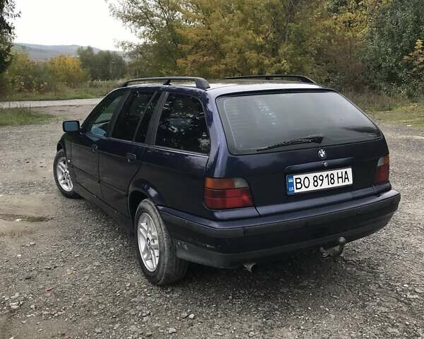 Синий БМВ 3 Серия, объемом двигателя 1.8 л и пробегом 380 тыс. км за 4000 $, фото 2 на Automoto.ua