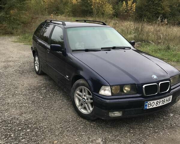 Синий БМВ 3 Серия, объемом двигателя 1.8 л и пробегом 380 тыс. км за 4000 $, фото 4 на Automoto.ua