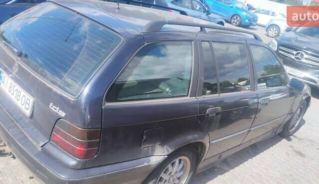 Синий БМВ 3 Серия, объемом двигателя 2.5 л и пробегом 430 тыс. км за 3900 $, фото 4 на Automoto.ua