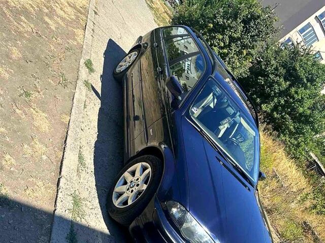 Синий БМВ 3 Серия, объемом двигателя 2 л и пробегом 274 тыс. км за 4000 $, фото 1 на Automoto.ua