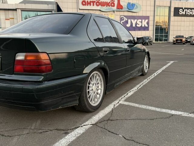 Зеленый БМВ 3 Серия, объемом двигателя 1.8 л и пробегом 111 тыс. км за 2100 $, фото 4 на Automoto.ua