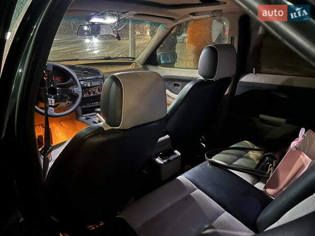 Зеленый БМВ 3 Серия, объемом двигателя 2 л и пробегом 200 тыс. км за 2400 $, фото 8 на Automoto.ua