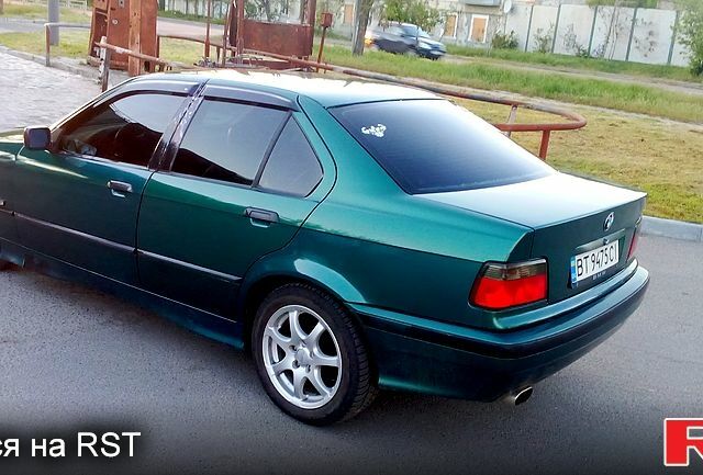 Зеленый БМВ 3 Серия, объемом двигателя 1.8 л и пробегом 243 тыс. км за 2900 $, фото 4 на Automoto.ua