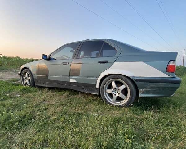 Зеленый БМВ 3 Серия, объемом двигателя 1.8 л и пробегом 333 тыс. км за 2200 $, фото 4 на Automoto.ua