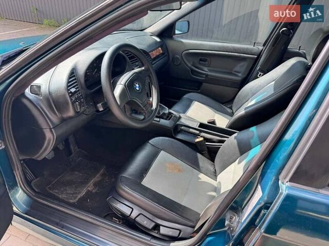 Зеленый БМВ 3 Серия, объемом двигателя 1.8 л и пробегом 471 тыс. км за 3800 $, фото 11 на Automoto.ua