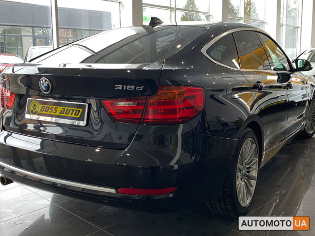 Черный БМВ 318, объемом двигателя 2 л и пробегом 230 тыс. км за 16450 $, фото 2 на Automoto.ua