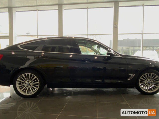 Черный БМВ 318, объемом двигателя 2 л и пробегом 230 тыс. км за 16450 $, фото 1 на Automoto.ua