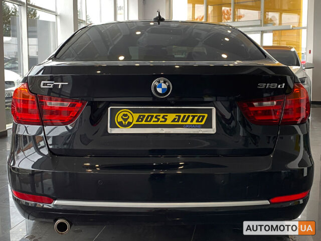 Черный БМВ 318, объемом двигателя 2 л и пробегом 230 тыс. км за 16450 $, фото 3 на Automoto.ua