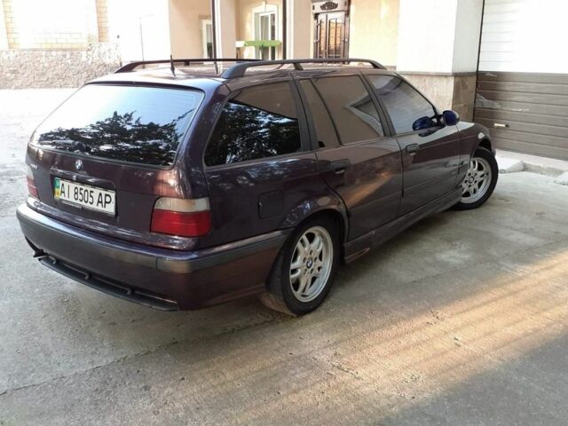 Фіолетовий БМВ 320, об'ємом двигуна 2 л та пробігом 310 тис. км за 5100 $, фото 1 на Automoto.ua
