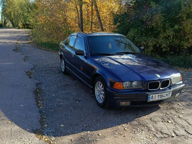 Синий БМВ 320, объемом двигателя 2 л и пробегом 300 тыс. км за 1850 $, фото 1 на Automoto.ua