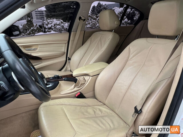 Белый БМВ 320и, объемом двигателя 2 л и пробегом 180 тыс. км за 13600 $, фото 16 на Automoto.ua