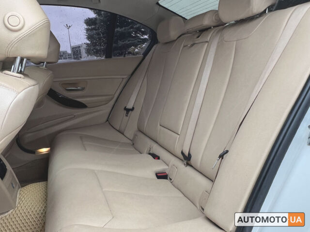 Белый БМВ 320и, объемом двигателя 2 л и пробегом 180 тыс. км за 13600 $, фото 9 на Automoto.ua