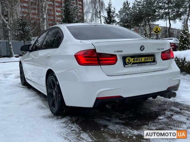 Белый БМВ 320и, объемом двигателя 2 л и пробегом 180 тыс. км за 13600 $, фото 4 на Automoto.ua