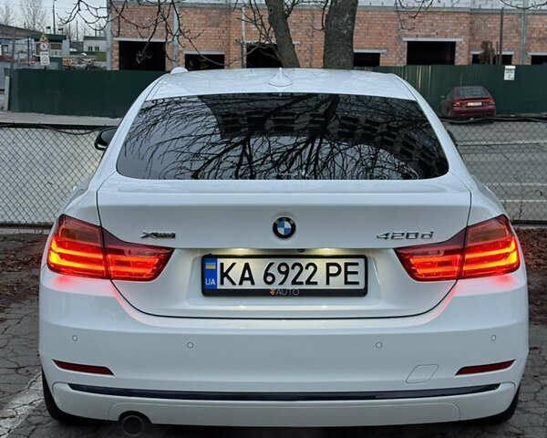 Белый БМВ 4 Серия, объемом двигателя 2 л и пробегом 187 тыс. км за 19000 $, фото 4 на Automoto.ua