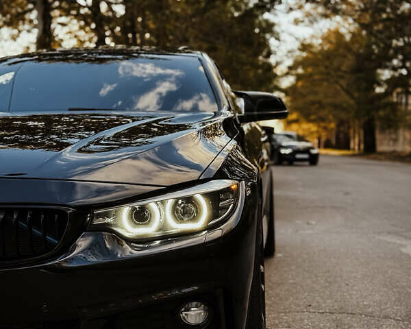 Черный БМВ 4 Серия, объемом двигателя 3 л и пробегом 125 тыс. км за 27300 $, фото 4 на Automoto.ua