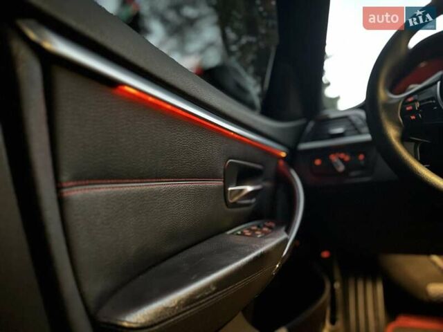 Красный БМВ 4 Серия, объемом двигателя 2 л и пробегом 190 тыс. км за 15250 $, фото 23 на Automoto.ua