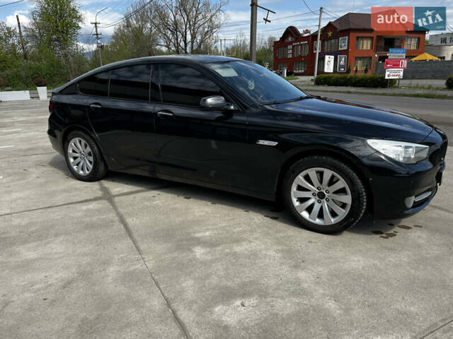 Черный БМВ 5 Серия ГТ, объемом двигателя 2.99 л и пробегом 360 тыс. км за 15300 $, фото 1 на Automoto.ua