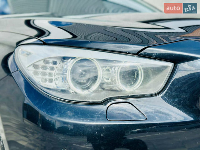 Черный БМВ 5 Серия ГТ, объемом двигателя 3 л и пробегом 151 тыс. км за 13790 $, фото 3 на Automoto.ua