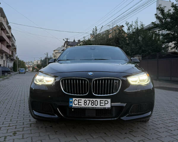 Чорний БМВ 5 Серія ГТ, об'ємом двигуна 3 л та пробігом 173 тис. км за 20300 $, фото 1 на Automoto.ua