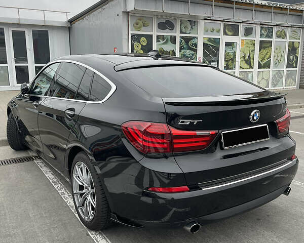 Черный БМВ 5 Серия ГТ, объемом двигателя 2.98 л и пробегом 155 тыс. км за 20000 $, фото 1 на Automoto.ua