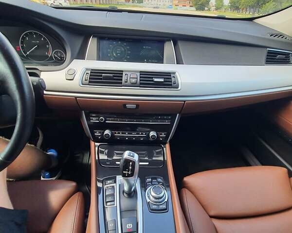 Красный БМВ 5 Серия ГТ, объемом двигателя 3 л и пробегом 286 тыс. км за 20450 $, фото 3 на Automoto.ua